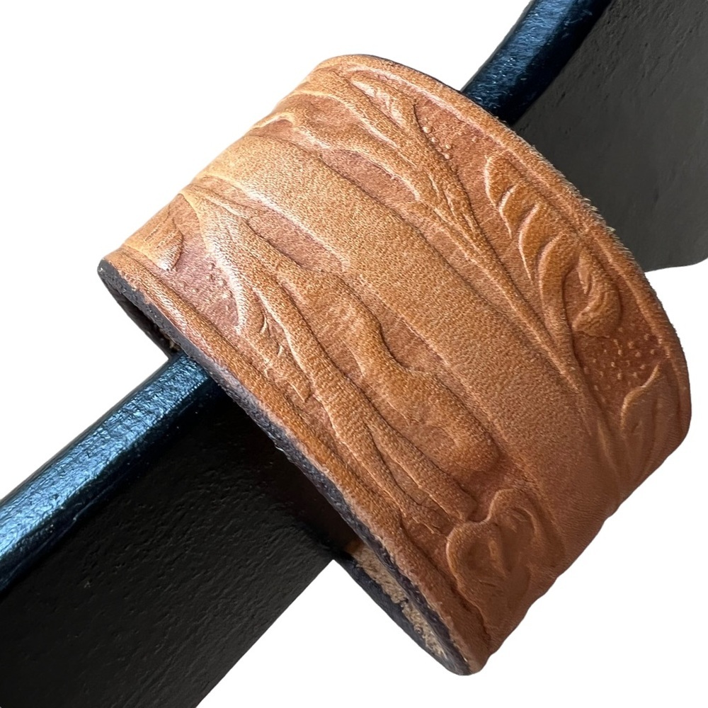 Hand tooled, artisan made tan leather bracelet from recycled vintage 70s
